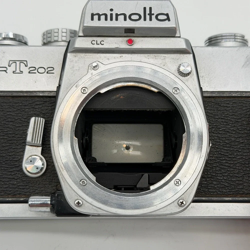 Minolta SRT 202 35mm SLR Film Camera Body Silver Black Vintage 2396308